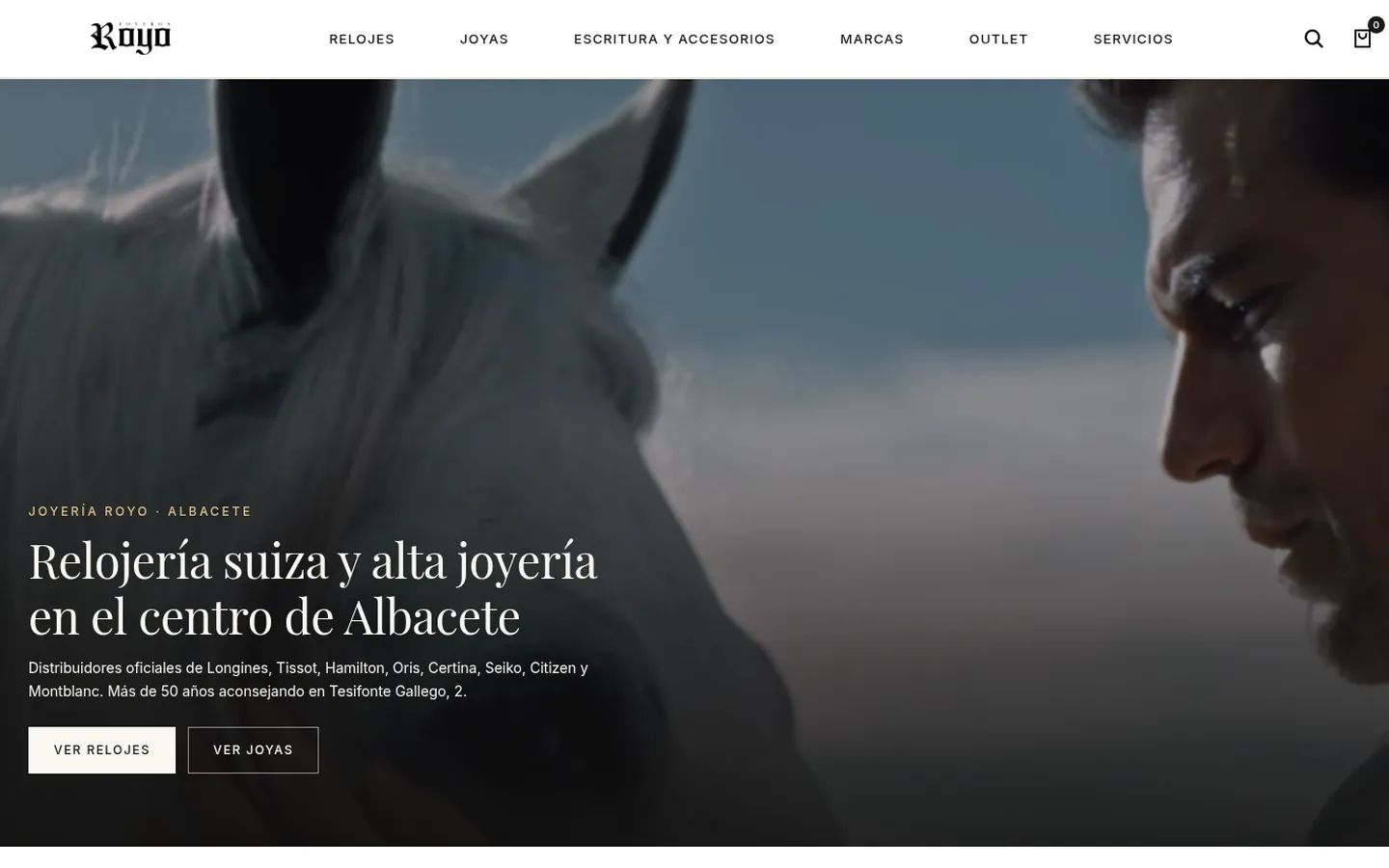 Portada de Joyería Royo: un caballo blanco junto a un hombre y el titular «Relojería suiza y alta joyería en el centro de Albacete»